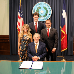Texas Values Action staff with Gov. Abbott after the signing.